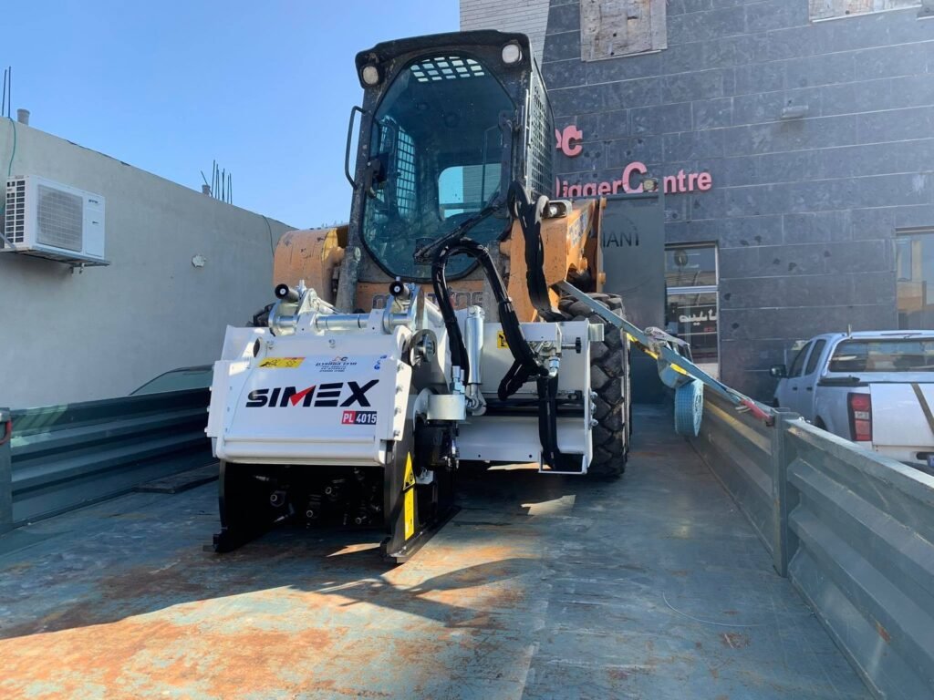 מקרצפת SIMEX מותקנת על מעמיס במרכז המחפרון